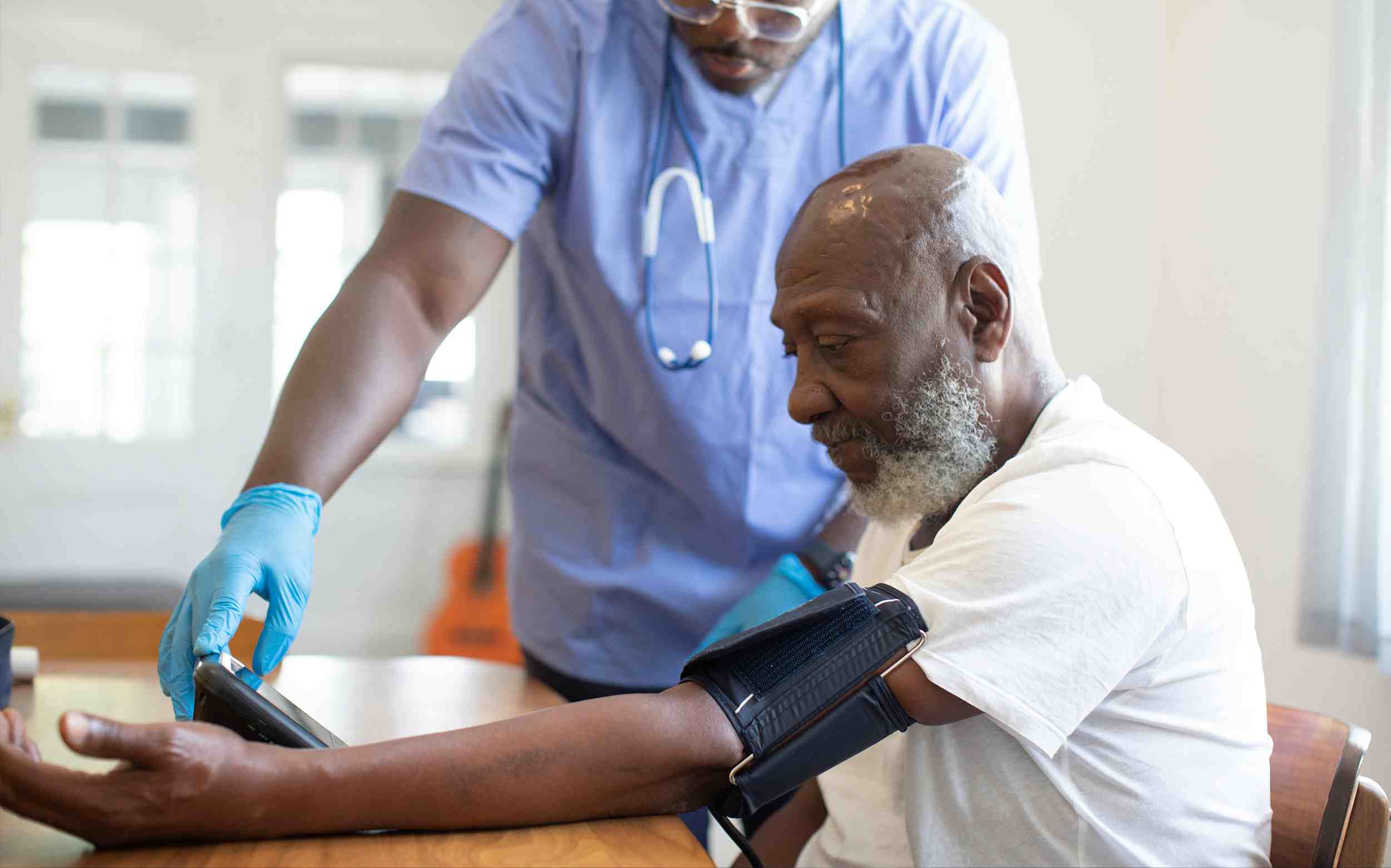Healthacare staff checking patient
